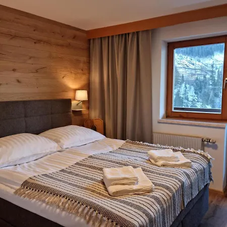 The At Apartmanhotel *
